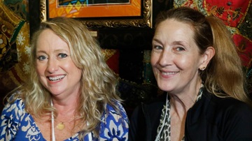 Two women at a chapter event