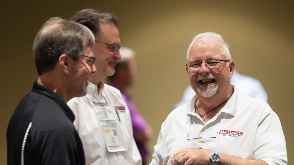 TechDivision-Networking-Hero Three men conversing